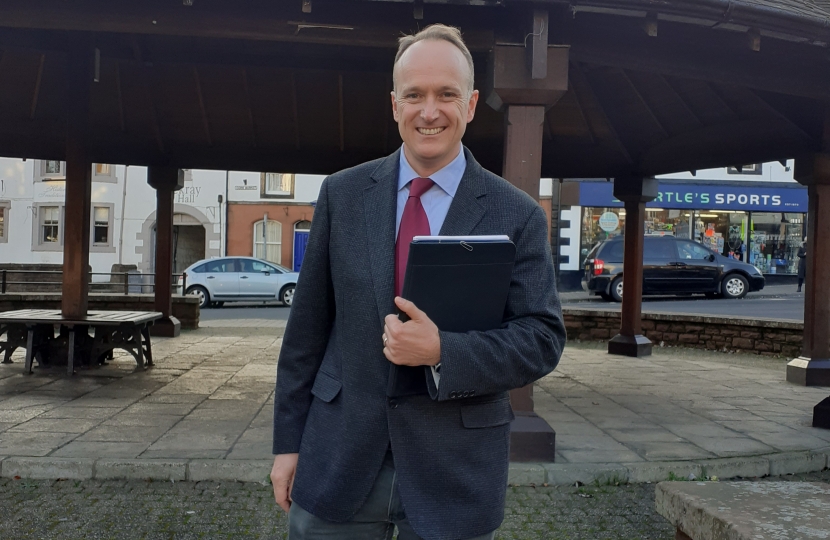 Image of Dr Neil Hudson MP outside Penrith bandstand