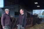 Neil & Farmer in cow shed