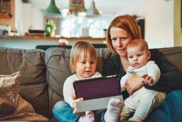 IMAGE: Family using tablet