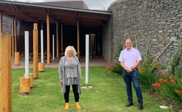 Annie Mawson and Neil Hudson MP outside the Sunbeams Centre, Redhills