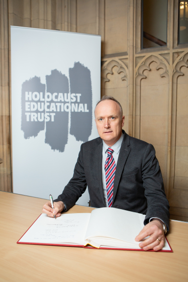 Dr Neil Hudson MP signs Holocaust Educational Trust's Book of Commitment